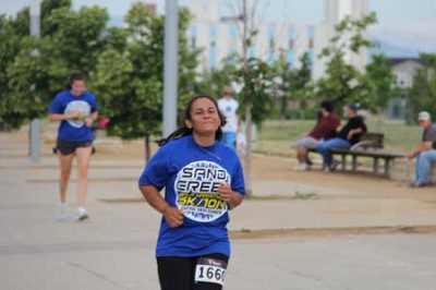 Misty Paulson runs in the Sand Creek 5K.